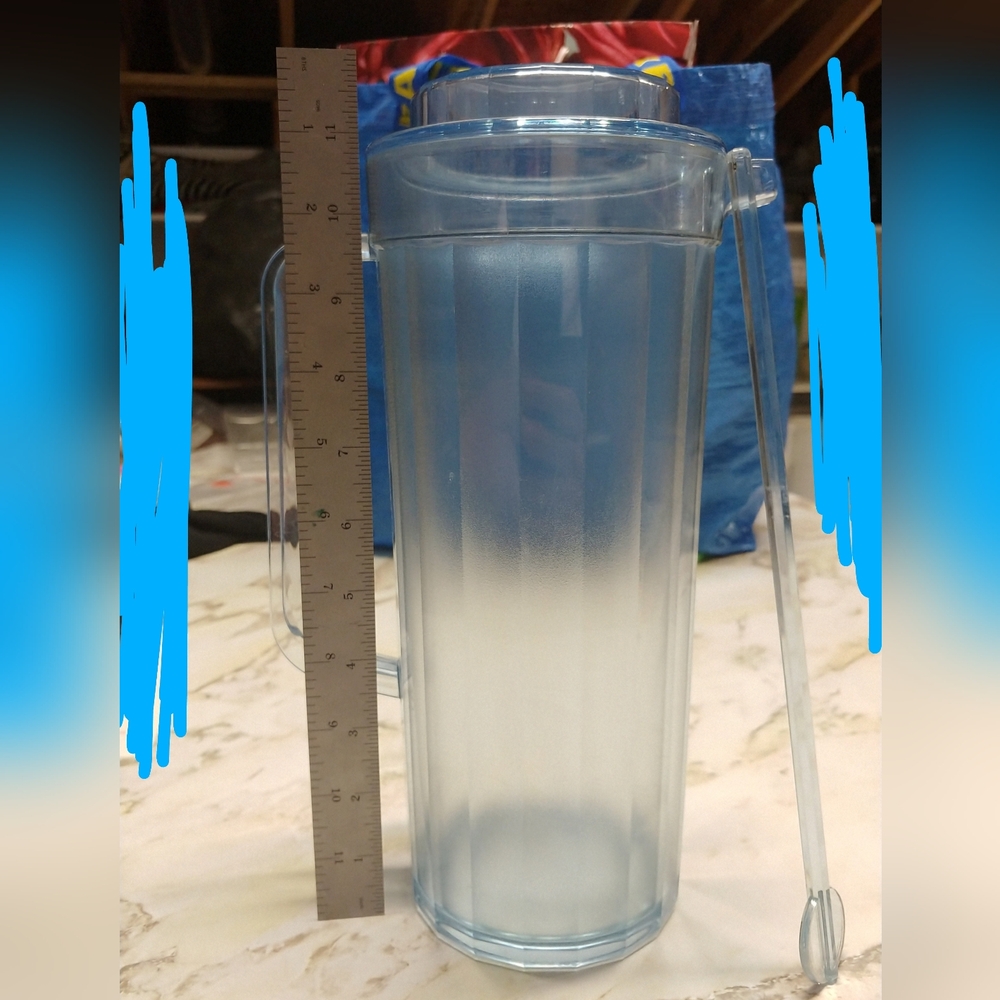 Clear Tupperware Pitcher with Stirrer. 11.5 Inches High
